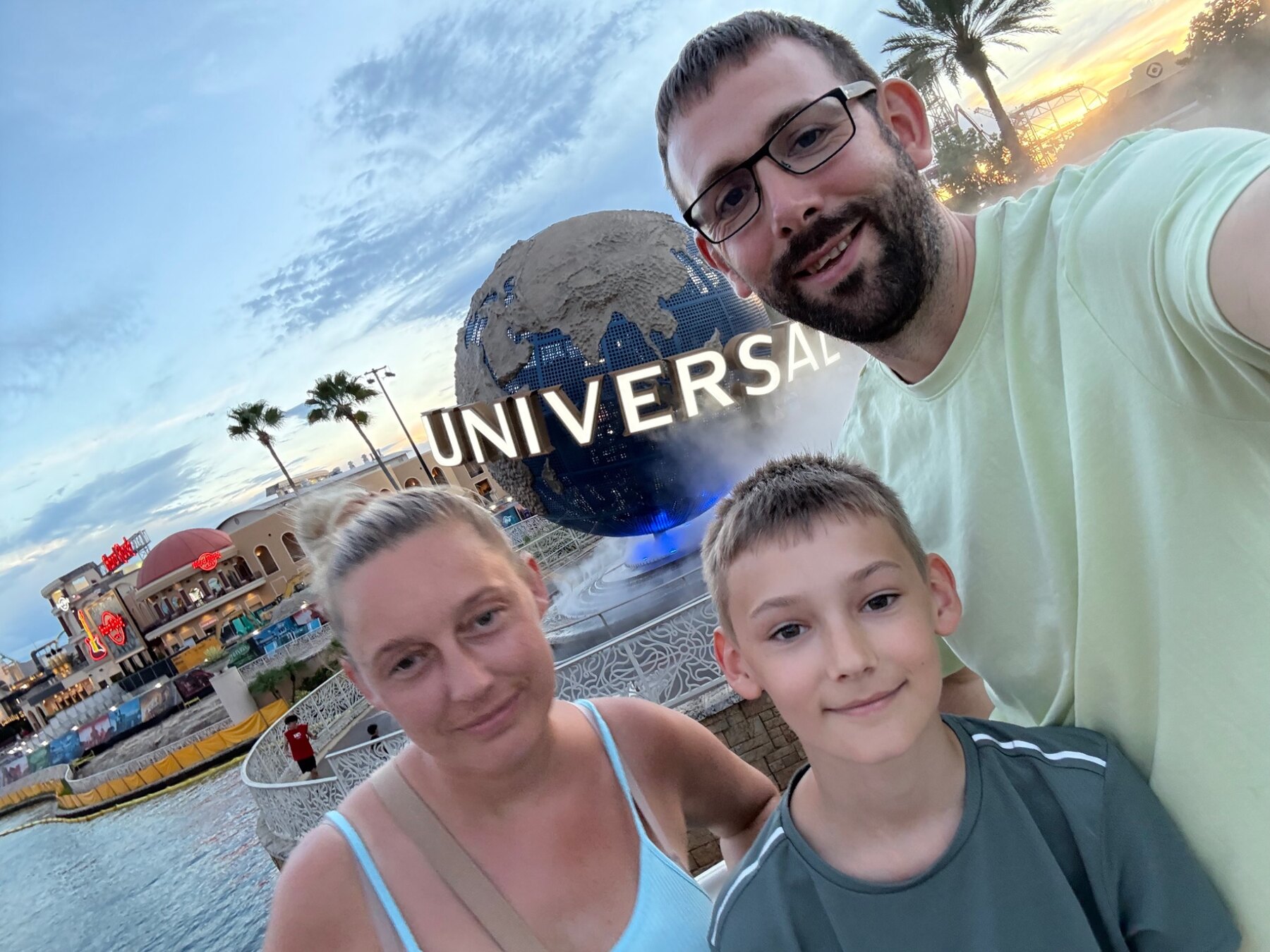 The Go Yolo Travel family at the Universal Orlando globe